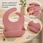 Babador rosa com bolso coletor e ajuste de pescoço